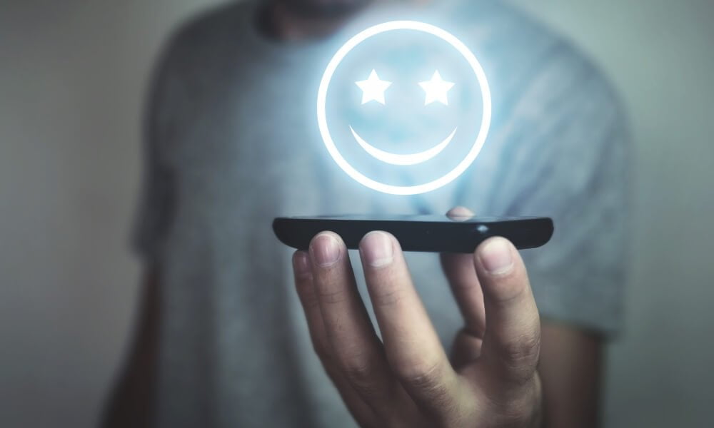 Keep your customers happy is a guy hold a happy face